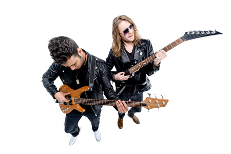 elevated view of musicians with electric guitars isolated on whiteの写真素材