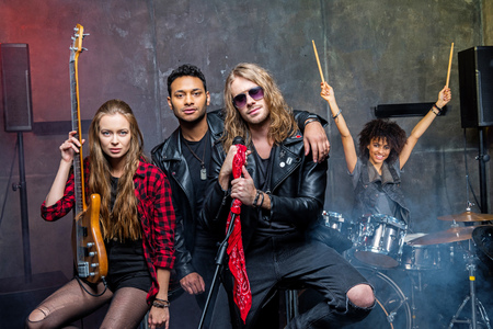 rock band posing in studioの写真素材