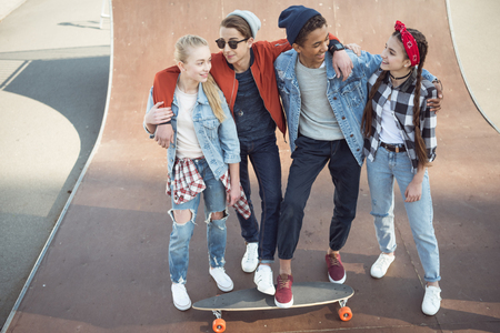 teenagers spending time at skateboard parkの写真素材