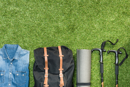 Traveler set on grassy background, flat layの写真素材