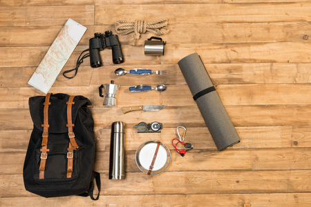 Traveler set on wooden background, flat layの写真素材