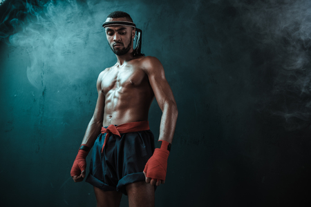 Muay Thai athlete training at Thai boxing indoorsの写真素材