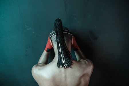 Muay Thai athlete training at Thai boxing indoors, ultimate fight conceptの写真素材