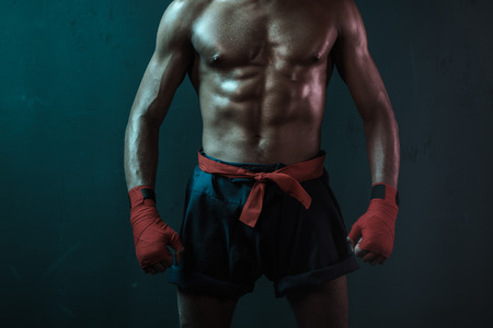 Muay Thai athlete training at Thai boxing indoors, ultimate fight conceptの写真素材