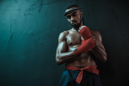 Muay Thai athlete training at Thai boxing indoorsの写真素材