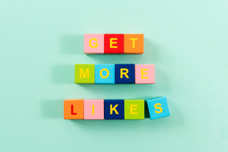colorful cubes with text get more likesの写真素材