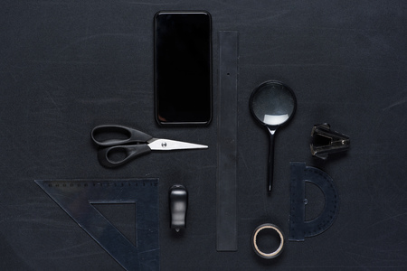 smartphone with various office utensils mock-up