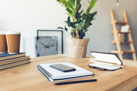 design of workplace in home office with modern equipment and objects