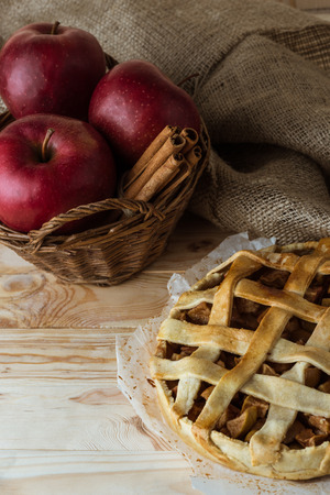 homemade apple pie and fresh organic ingredients in basketの写真素材