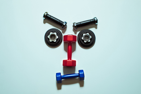 Top view of various dumbbells and weight platesの写真素材