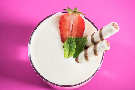 fresh milkshake with strawberry, mint and sweet strawsの写真素材