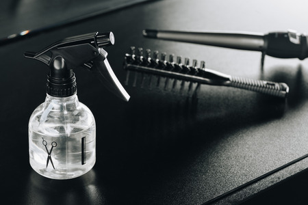 several hair styling supplies on tableの写真素材