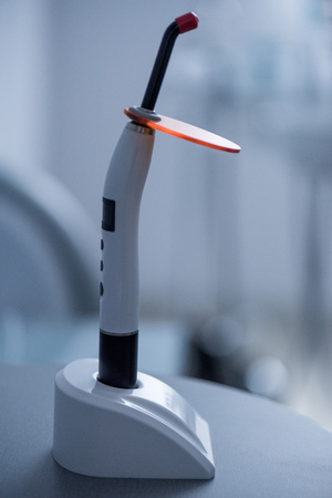 dental curing light in dentist officeの写真素材
