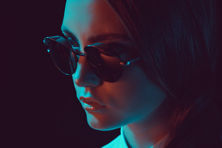 fashionable young caucasian woman in stylish sunglassesの写真素材