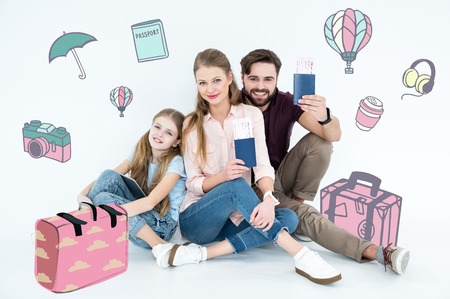 Happy family ready for vacationの写真素材