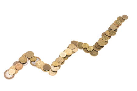 coins arranged in line isolated on white