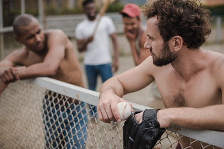 young multiethnic male baseball players on courtの写真素材