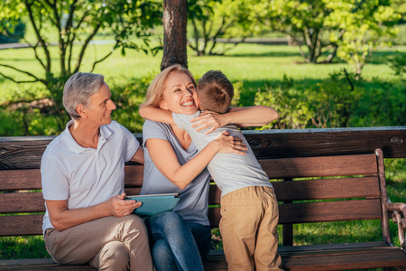 family with digital tabletの写真素材