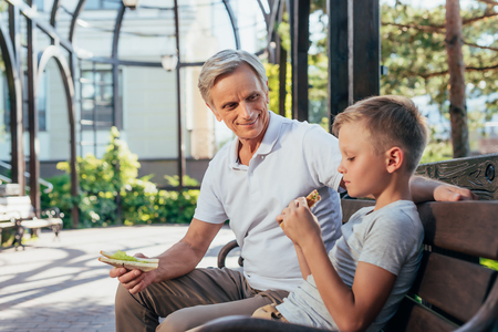 family eating sandwichesの写真素材