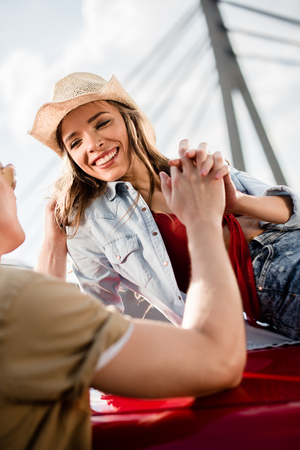 young couple holding handsの写真素材