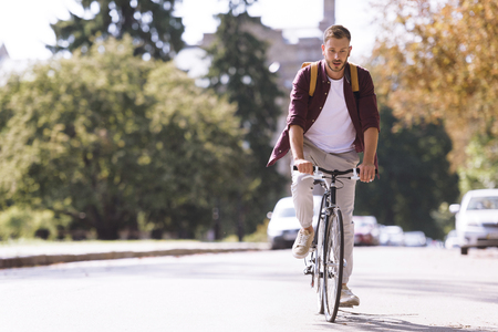 man riding bicycleの写真素材