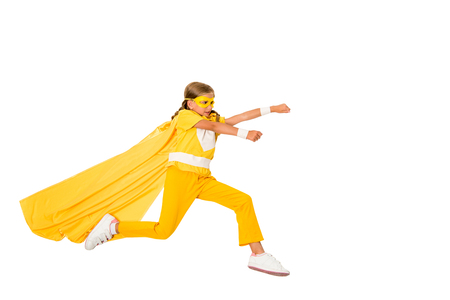 superhero girl in cape runningの写真素材