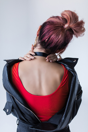 fashionable girl in leather jacketの写真素材