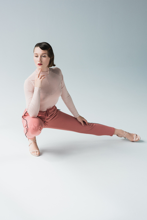 thoughtful woman in retro clothingの写真素材