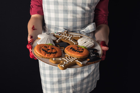 girl with halloween cookiesの写真素材