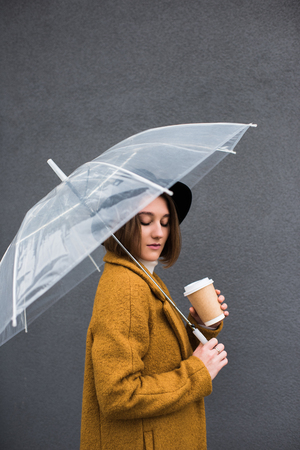 stylish woman with umbrellaの写真素材