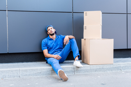 exhausted delivery manの写真素材