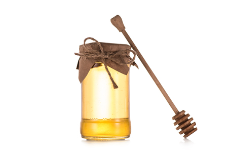 fresh honey in glass jarの写真素材