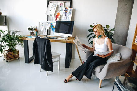 young fashion designer with sketchesの写真素材