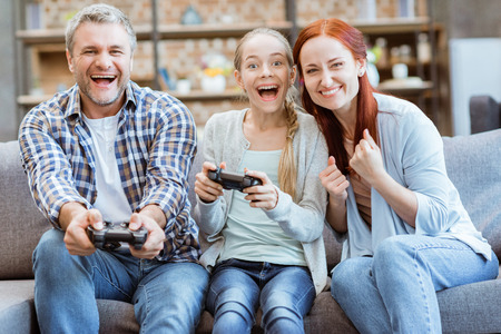 family playing video game