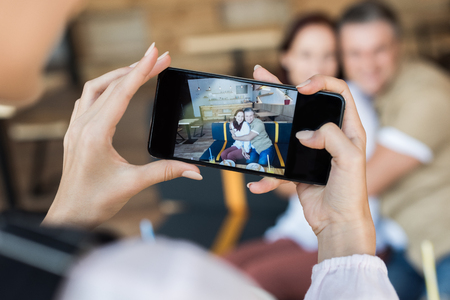 taking photo of mature coupleの写真素材