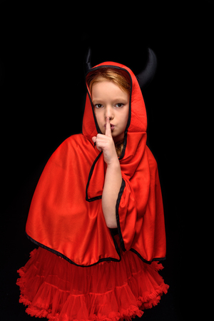 little devil with hush signの写真素材