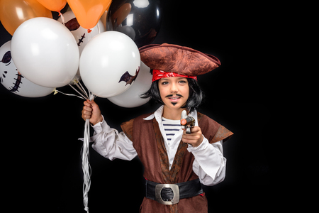 little pirate with gun and balloonsの写真素材