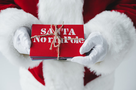santa claus holding lettersの写真素材