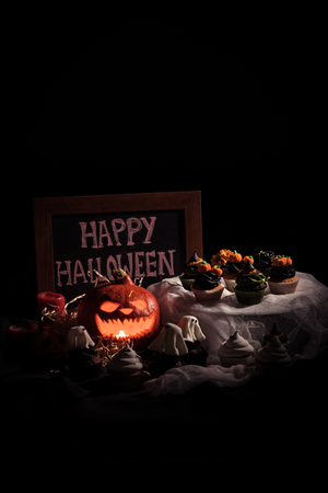 halloween cupcakes and pumpkinの写真素材