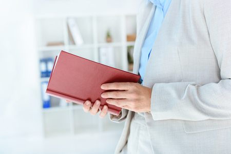 businesswoman reading bookの写真素材