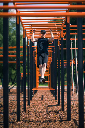 man exercising on sports ground