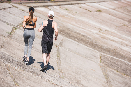 couple jogging on slabsの写真素材