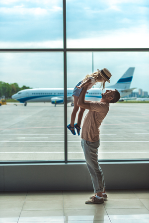 father and kid in airportの写真素材