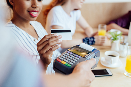 payment by credit card and terminalの写真素材