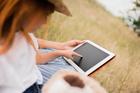 mother and daughter with digital tabletの写真素材