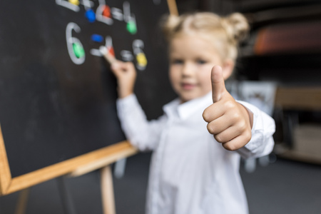 child studying numbers