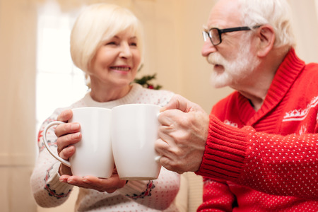 couple with coffee cupsの写真素材