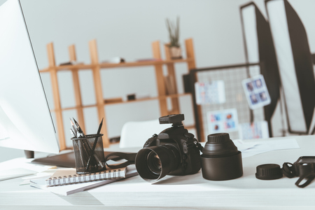 workspace with photo cameraの写真素材