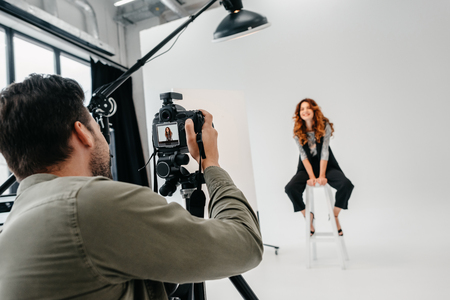 photographer and model on fashion shootの写真素材
