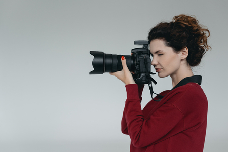 professional photographer with cameraの写真素材